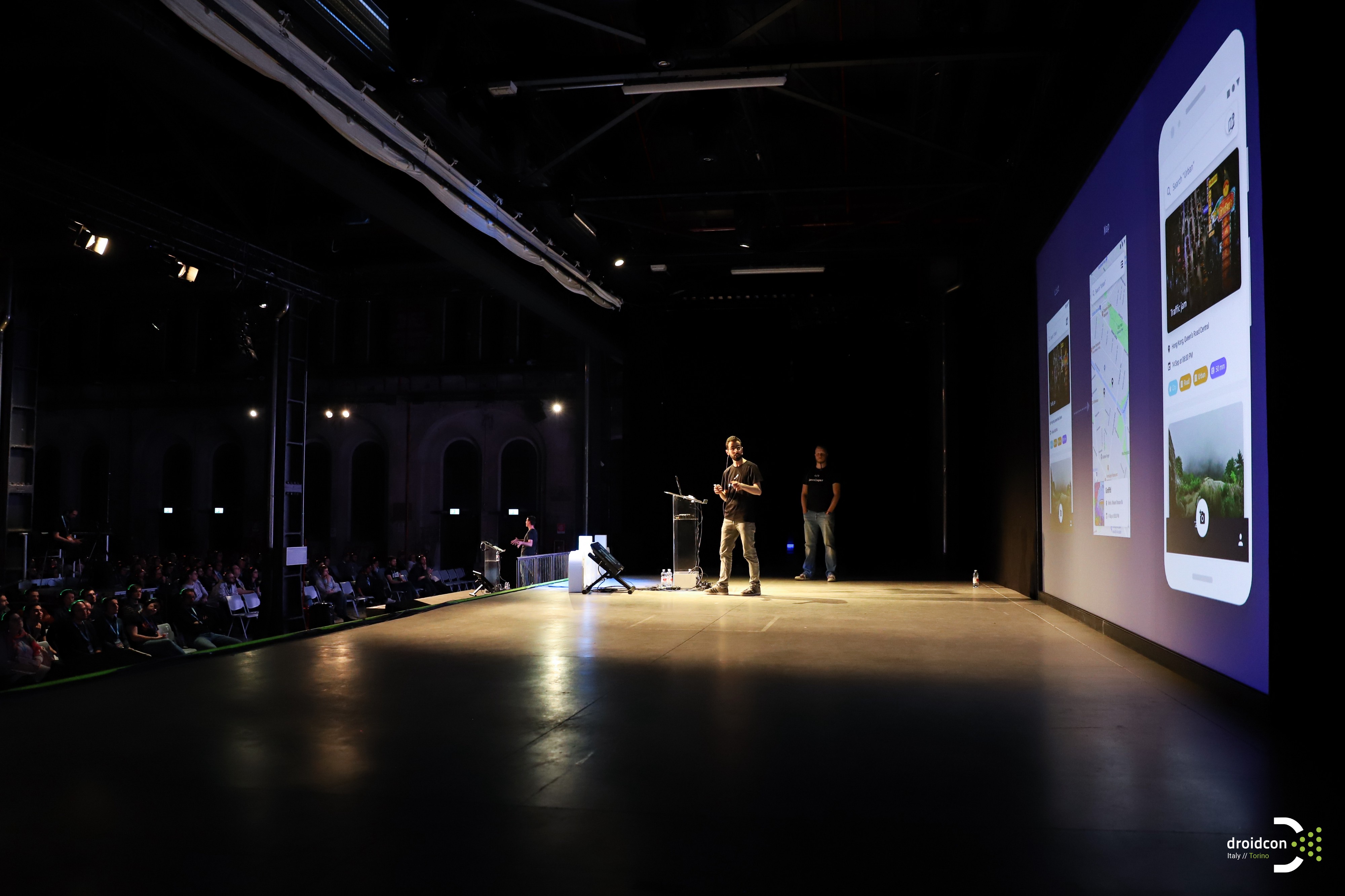 Snapp team talking at event in front of big crowd